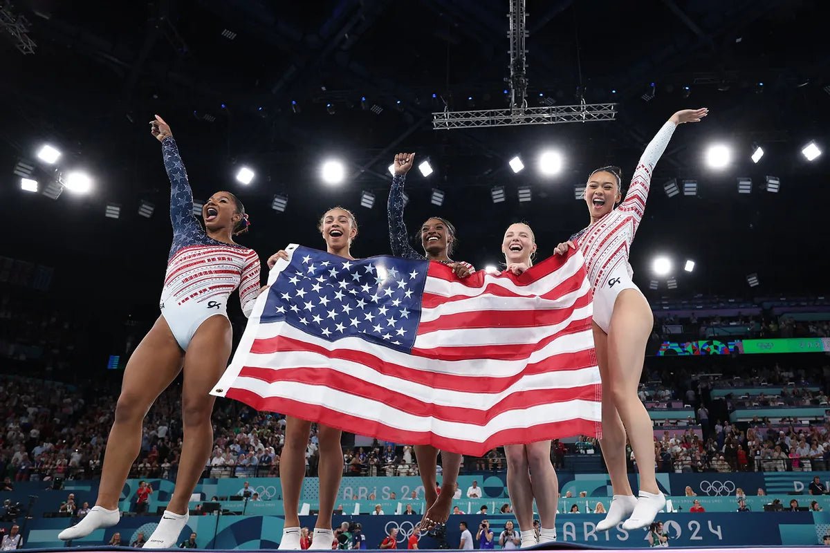 Triumph and Resilience: Simone Biles and Team USA Win Gold - Raise The Standard Apparel